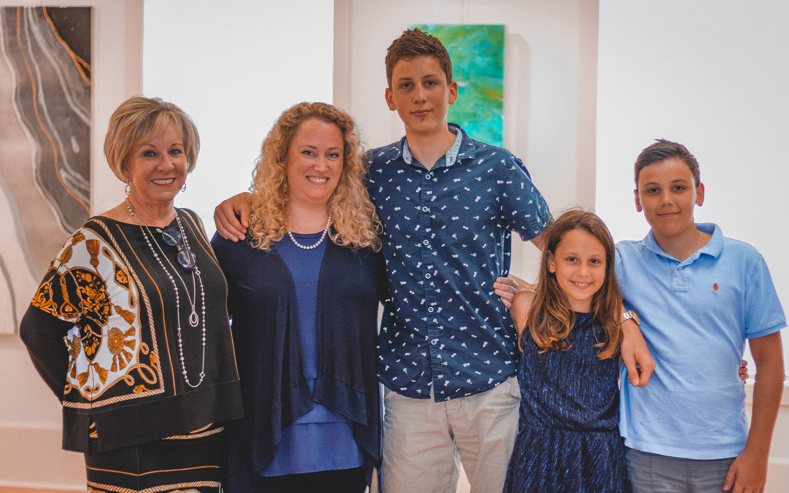 Guests and patrons attend soft opening for art gallery and studio