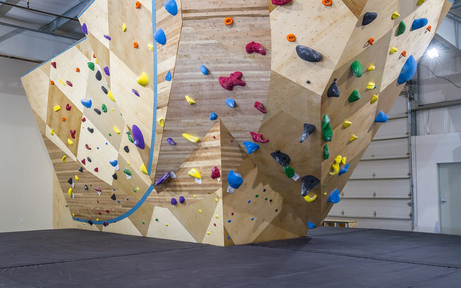 Climbing wall at indoor rock climbing gym