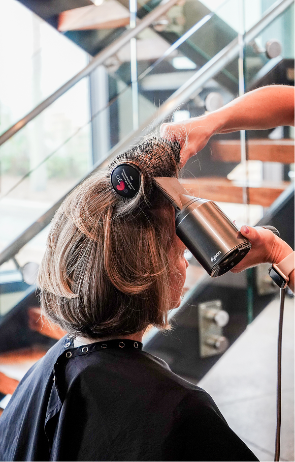 Woman's hair being dried