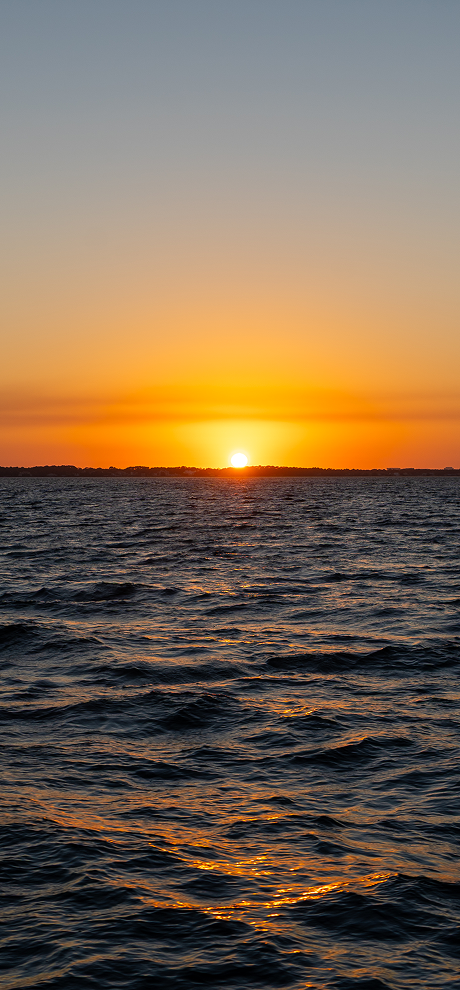 Sunset over the water